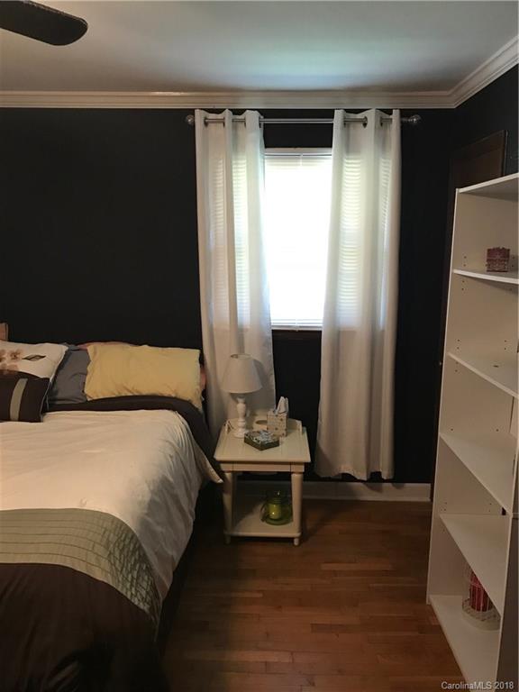 628 Loray Farm Road Dallas, NC 28034 - Photo 20 of 35 a bedroom with a bed and a window