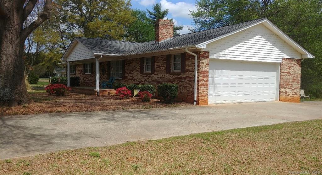 628 Loray Farm Road Dallas, NC 28034 - Photo 3 of 35 a view of a house with a patio and a yard