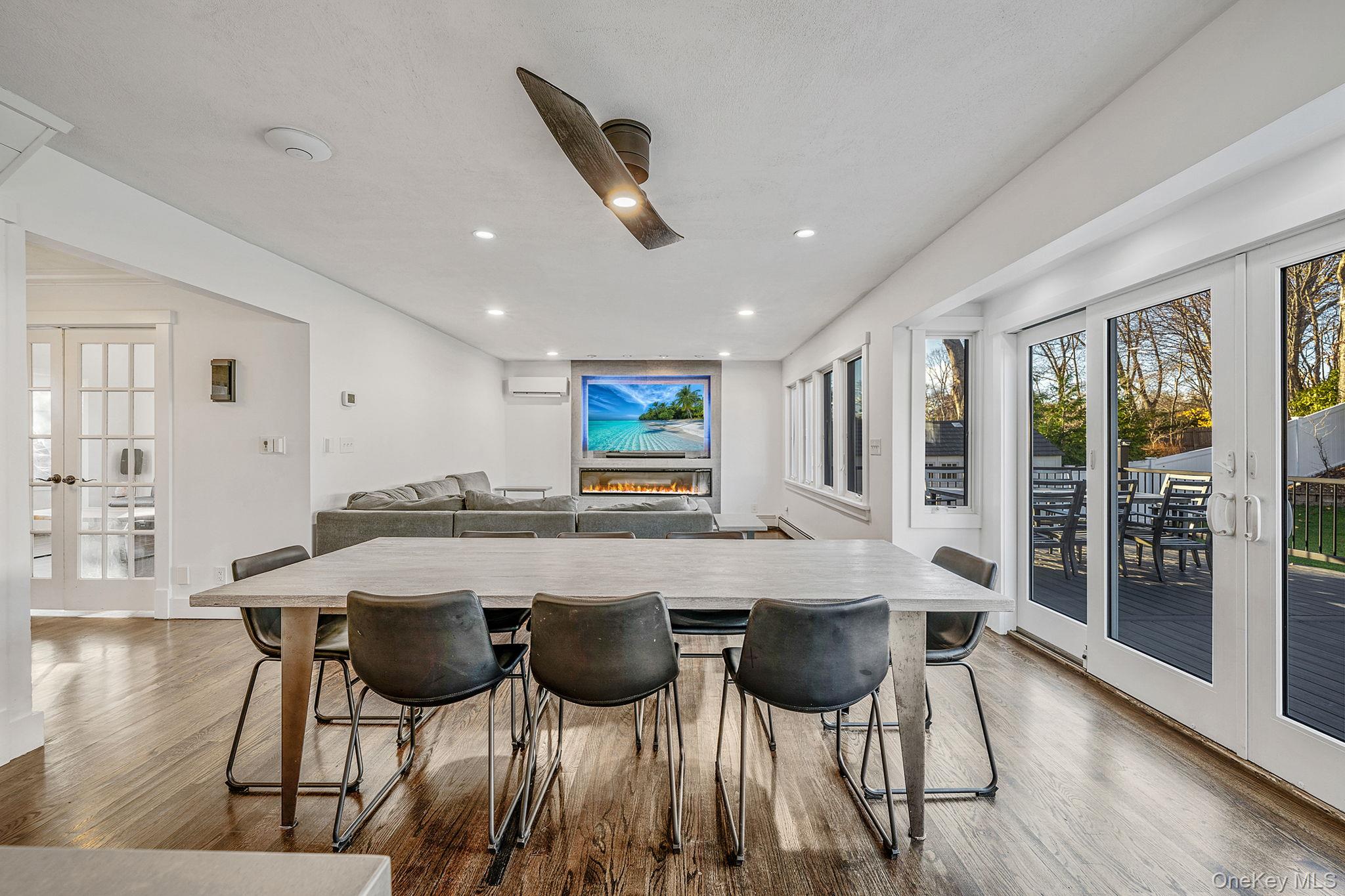 11 Chivalry Lane Nesconset, NY 11767 - Photo 10 of 35 a view of a dining room with furniture and wooden floor