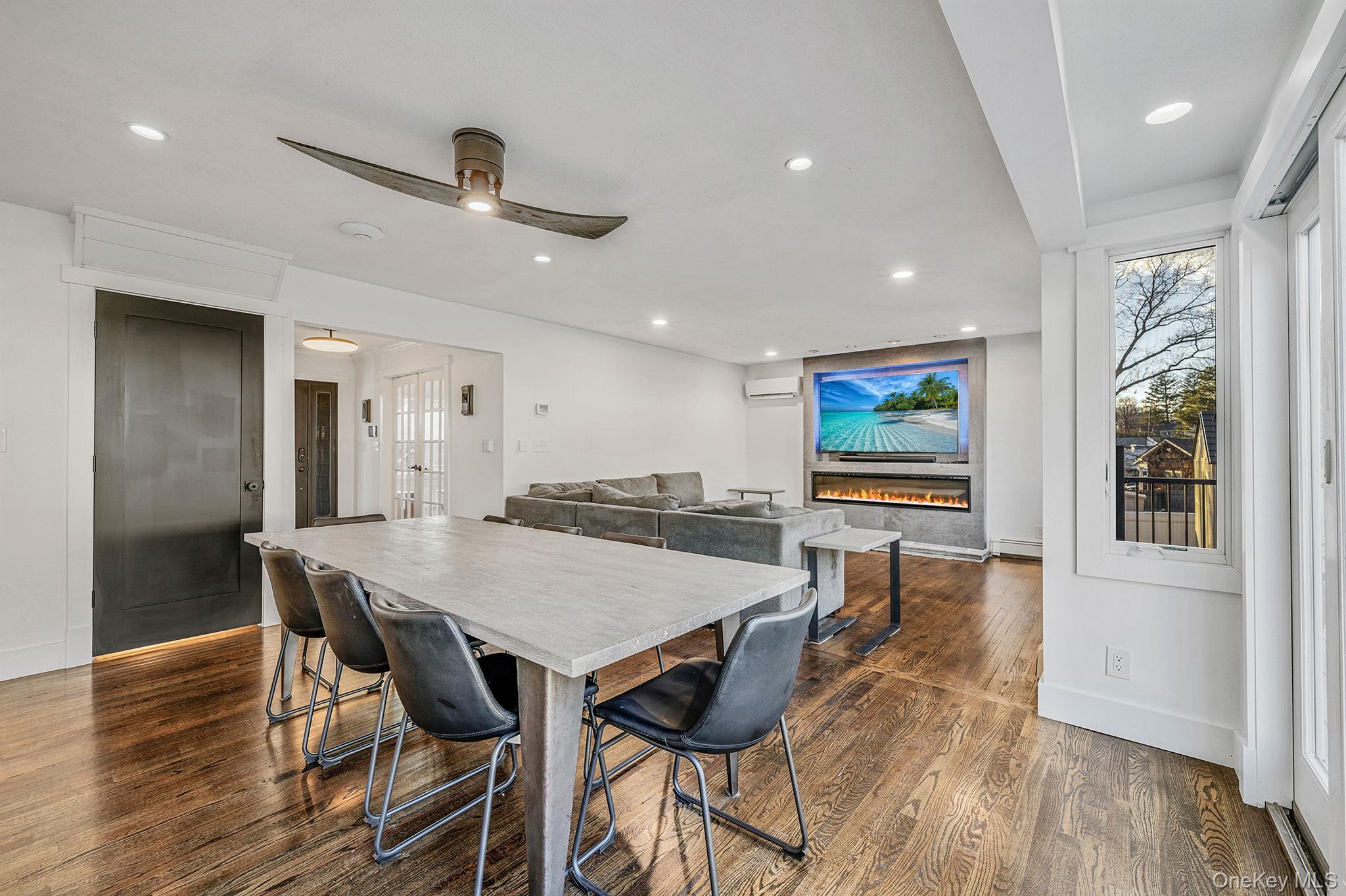 11 Chivalry Lane Nesconset, NY 11767 - Photo 11 of 35 a view of a dining room with furniture wooden floor and chandelier