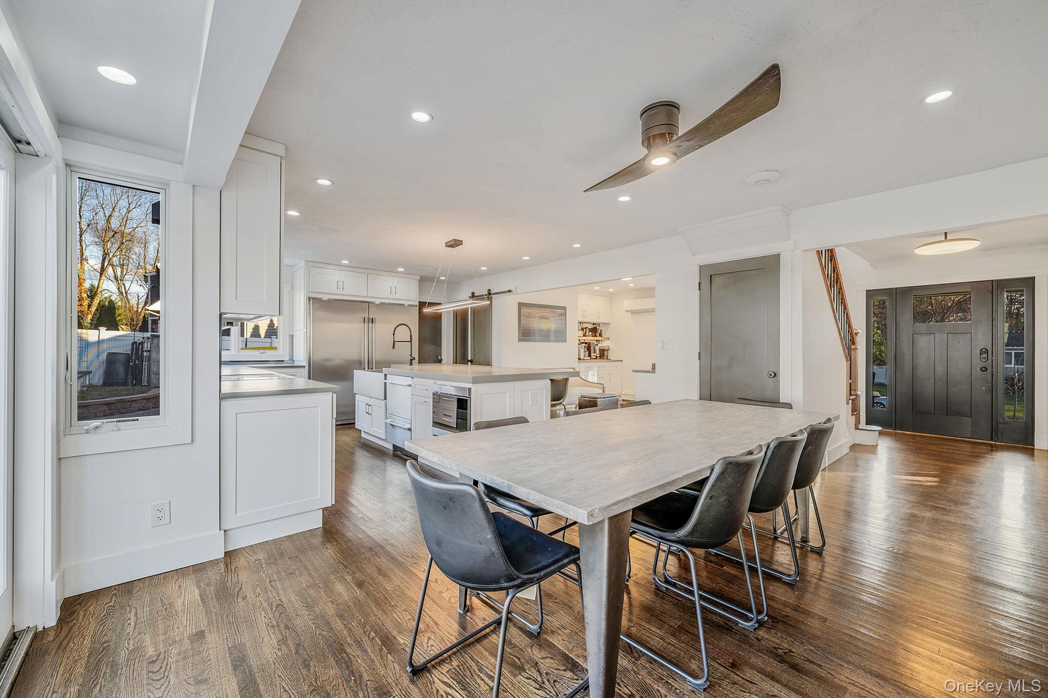 11 Chivalry Lane Nesconset, NY 11767 - Photo 12 of 35 a view of a dining room with furniture and wooden floor