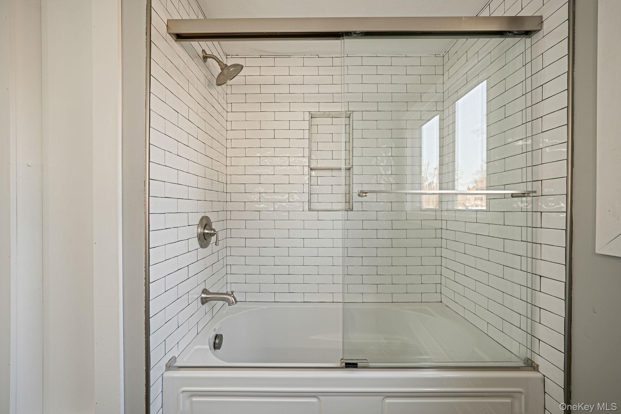 11 Chivalry Lane Nesconset, NY 11767 - Photo 17 of 35 a bathroom with a shower