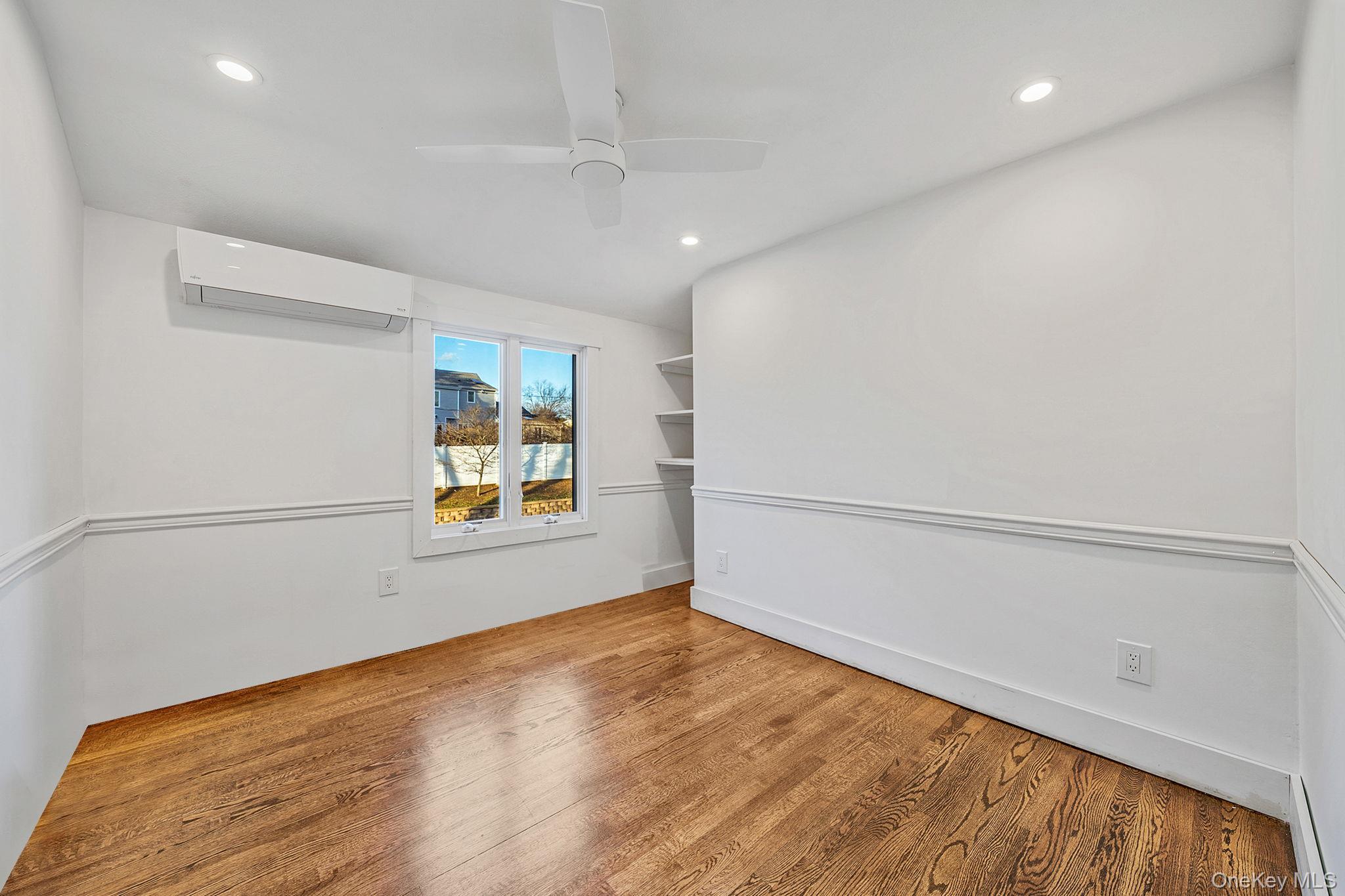 11 Chivalry Lane Nesconset, NY 11767 - Photo 20 of 35 a view of an empty room with a window