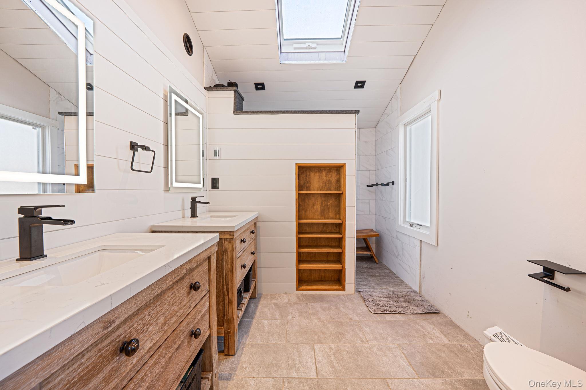 11 Chivalry Lane Nesconset, NY 11767 - Photo 27 of 35 a kitchen with a sink and stove