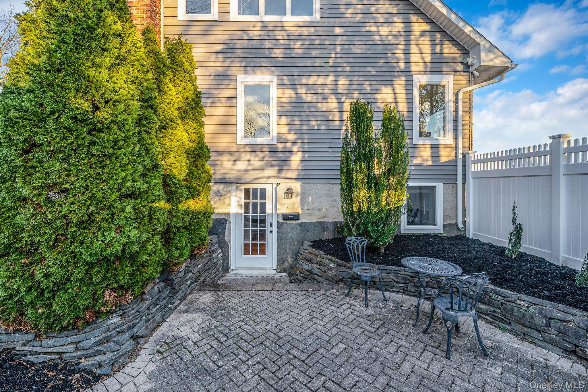 11 Chivalry Lane Nesconset, NY 11767 - Photo 30 of 35 a view of house with a patio