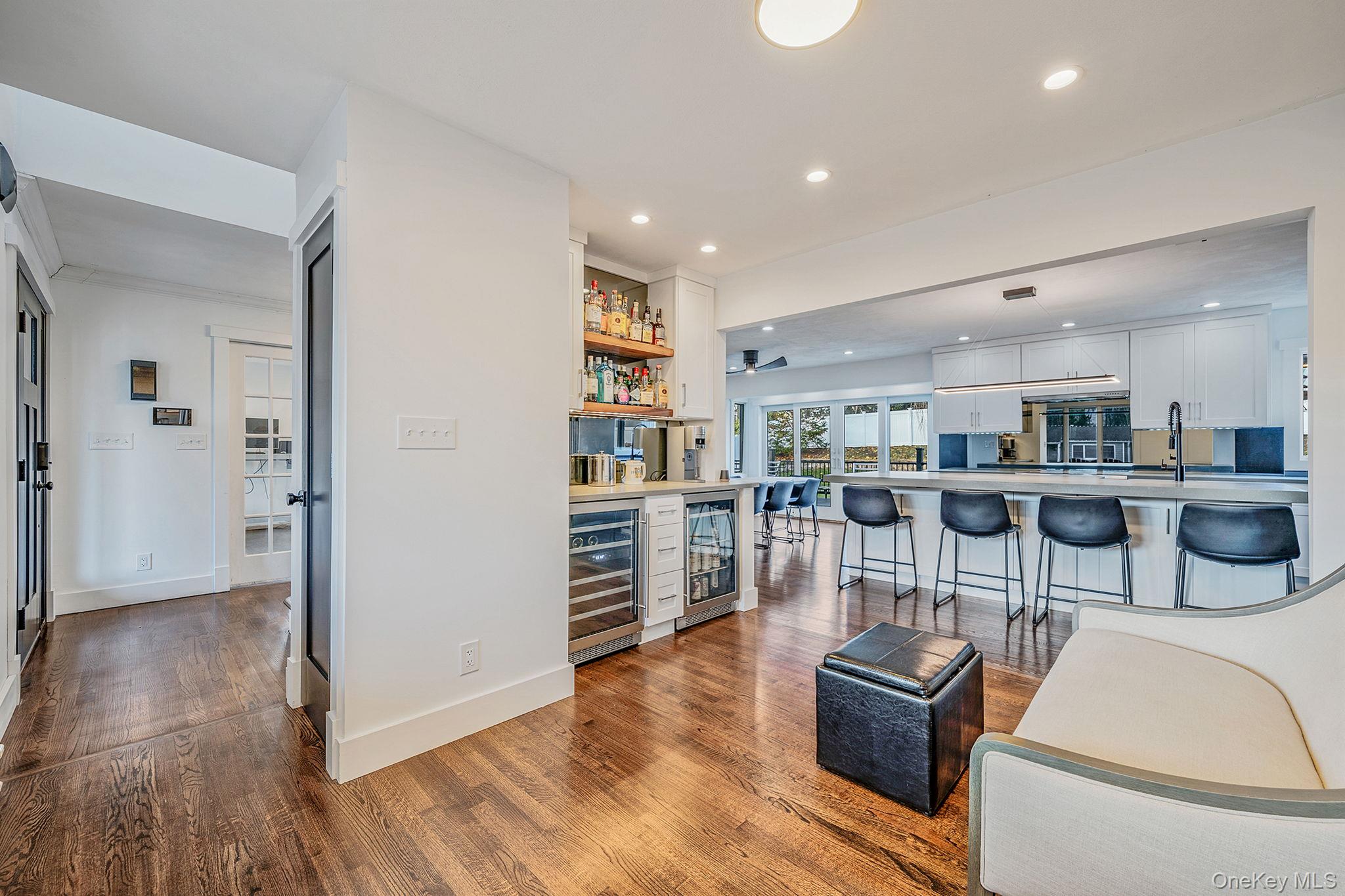 11 Chivalry Lane Nesconset, NY 11767 - Photo 8 of 35 a living room with lots of furniture and kitchen view