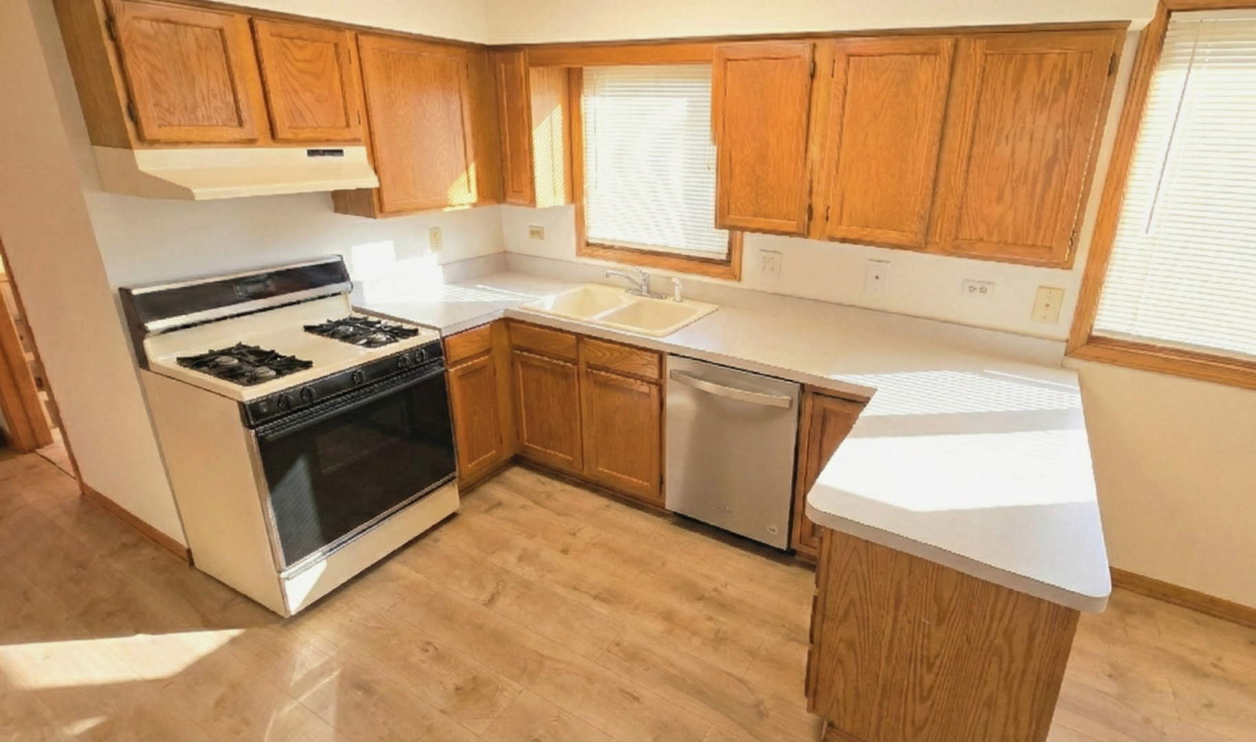 445 West 37th Street, Unit 1 Chicago, IL 60609 - Photo 2 of 13 a kitchen with granite countertop cabinets washer and dryer