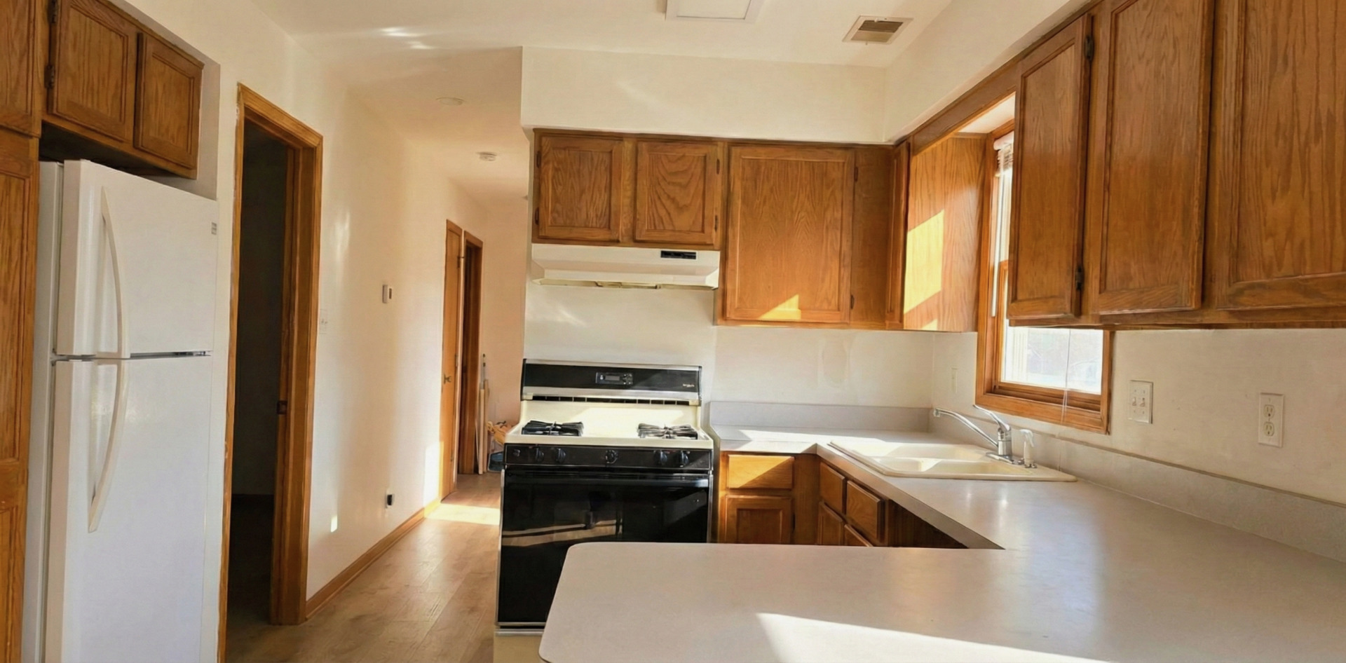 445 West 37th Street, Unit 1 Chicago, IL 60609 - Photo 3 of 13 a kitchen with stainless steel appliances a stove a sink and a refrigerator