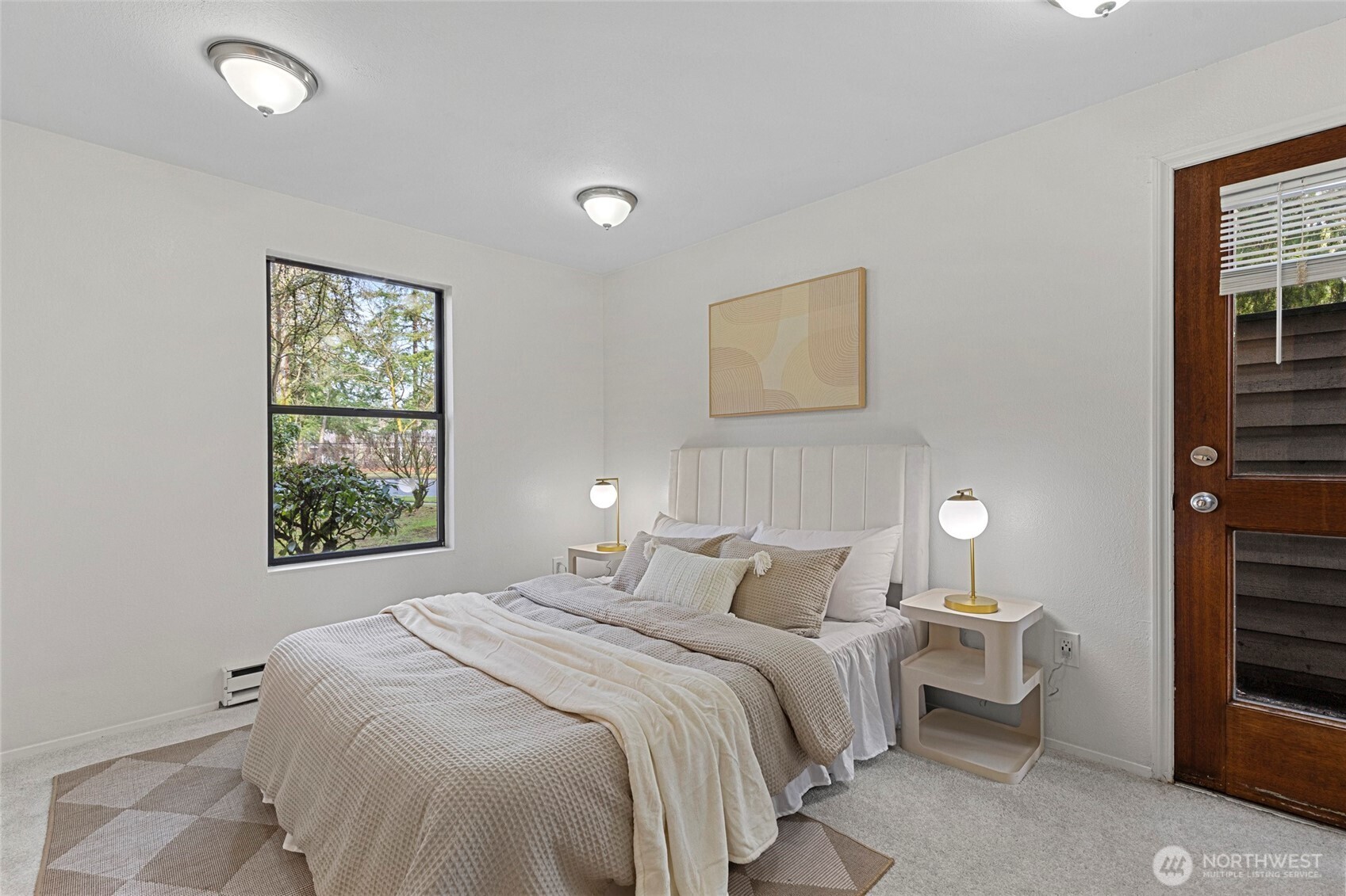 13801 Old Redmond Road, Unit A101 Redmond, WA 98052 - Photo 24 of 37 a bedroom with a bed and a window