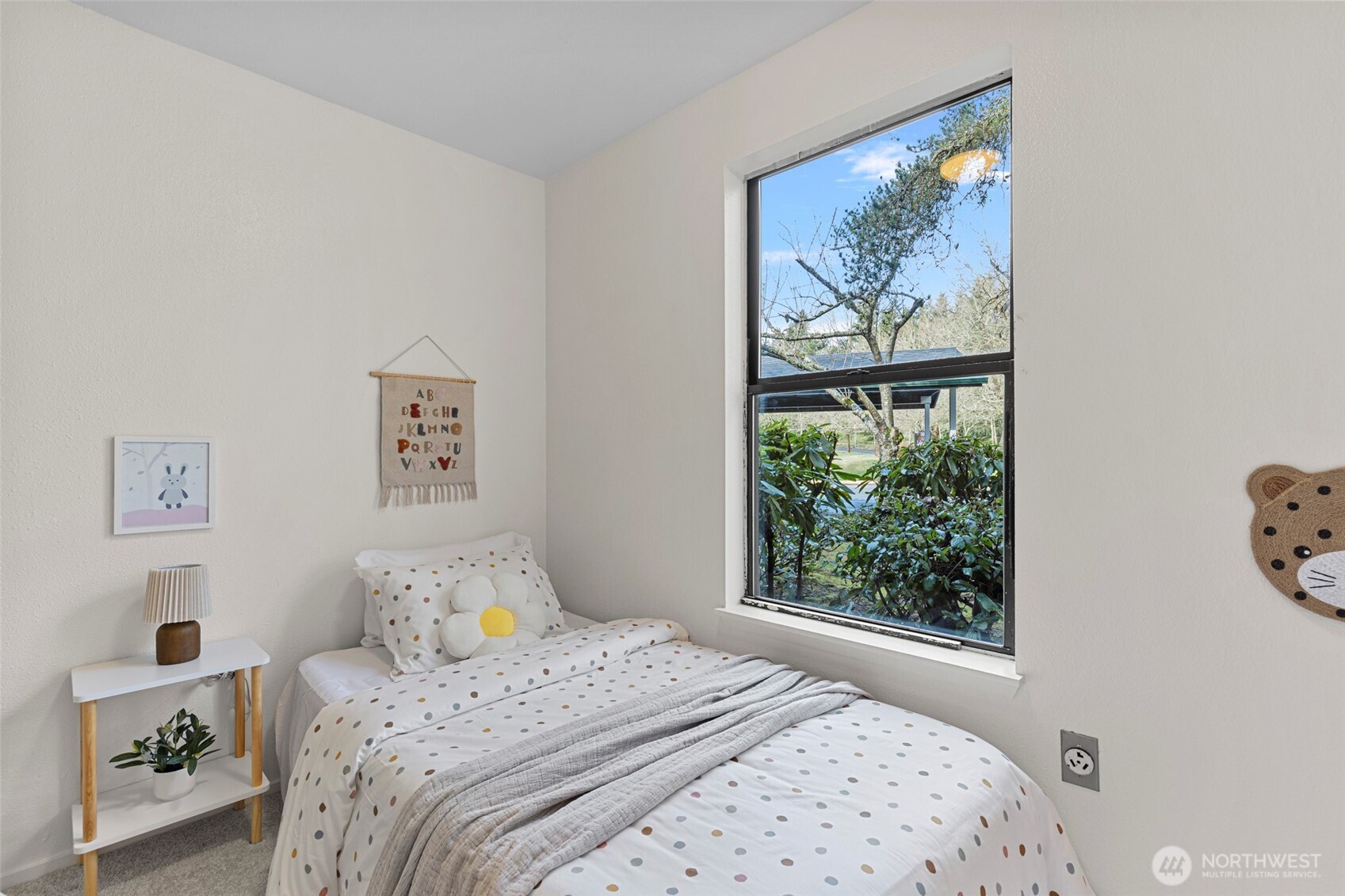 13801 Old Redmond Road, Unit A101 Redmond, WA 98052 - Photo 28 of 37 a bedroom with a large bed and a window