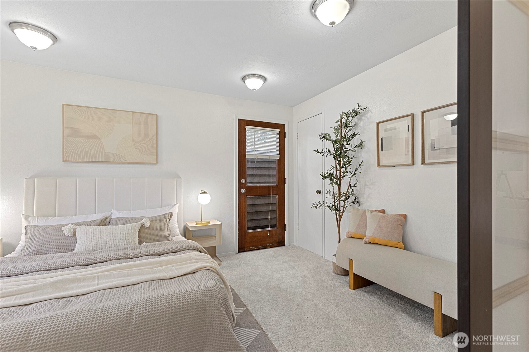13801 Old Redmond Road, Unit A101 Redmond, WA 98052 - Photo 30 of 37 a bedroom with a bed and a lamp