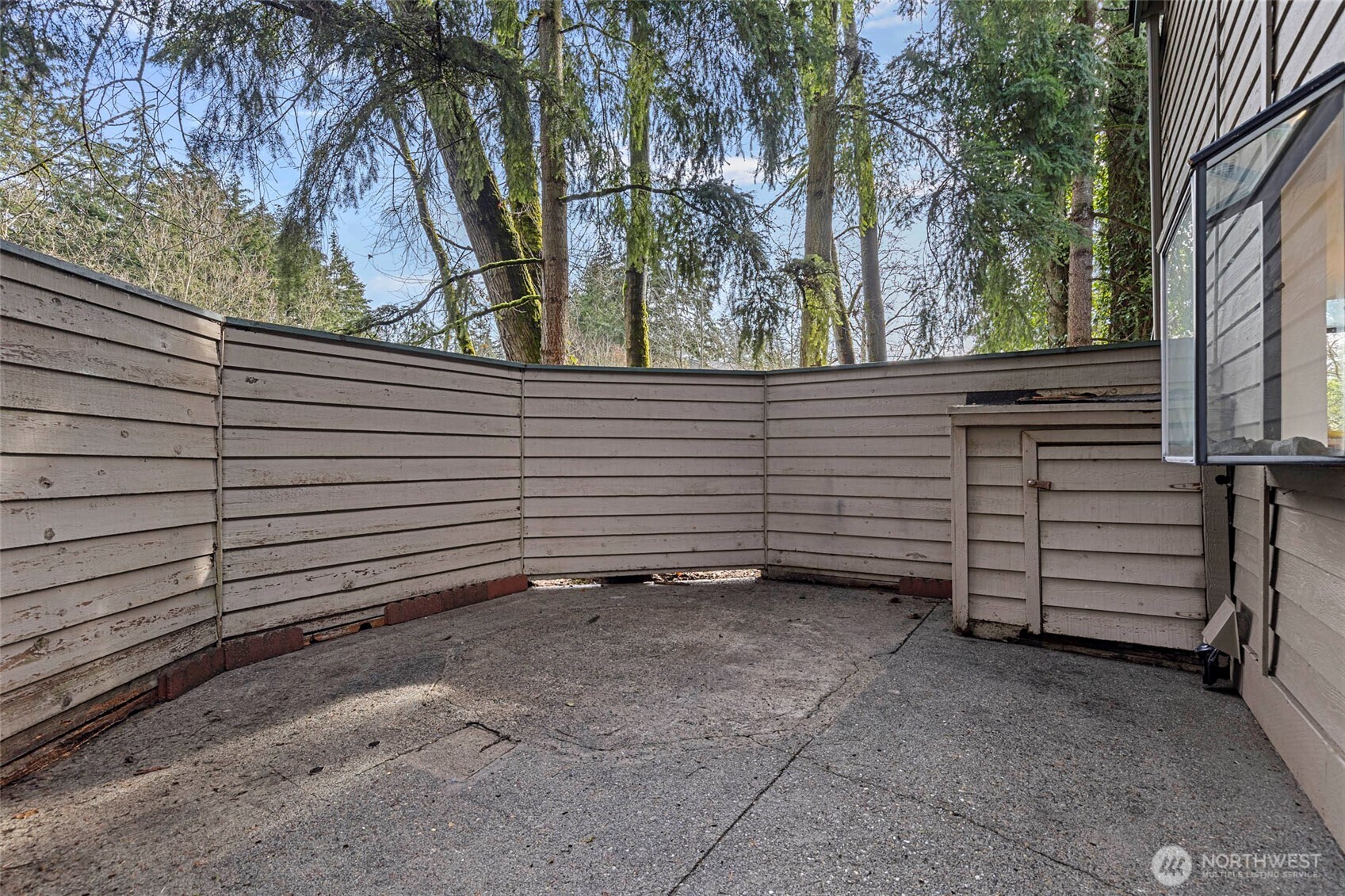 13801 Old Redmond Road, Unit A101 Redmond, WA 98052 - Photo 32 of 37 a view of a house with a backyard