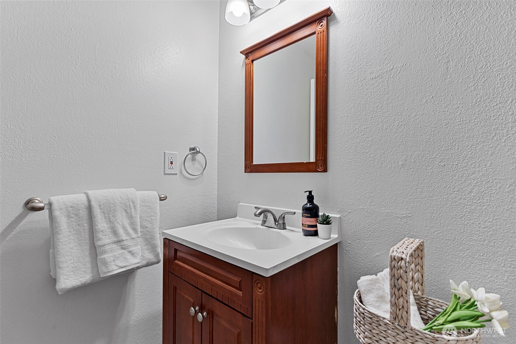 13801 Old Redmond Road, Unit A101 Redmond, WA 98052 - Photo 37 of 37 a bathroom with a sink and a mirror