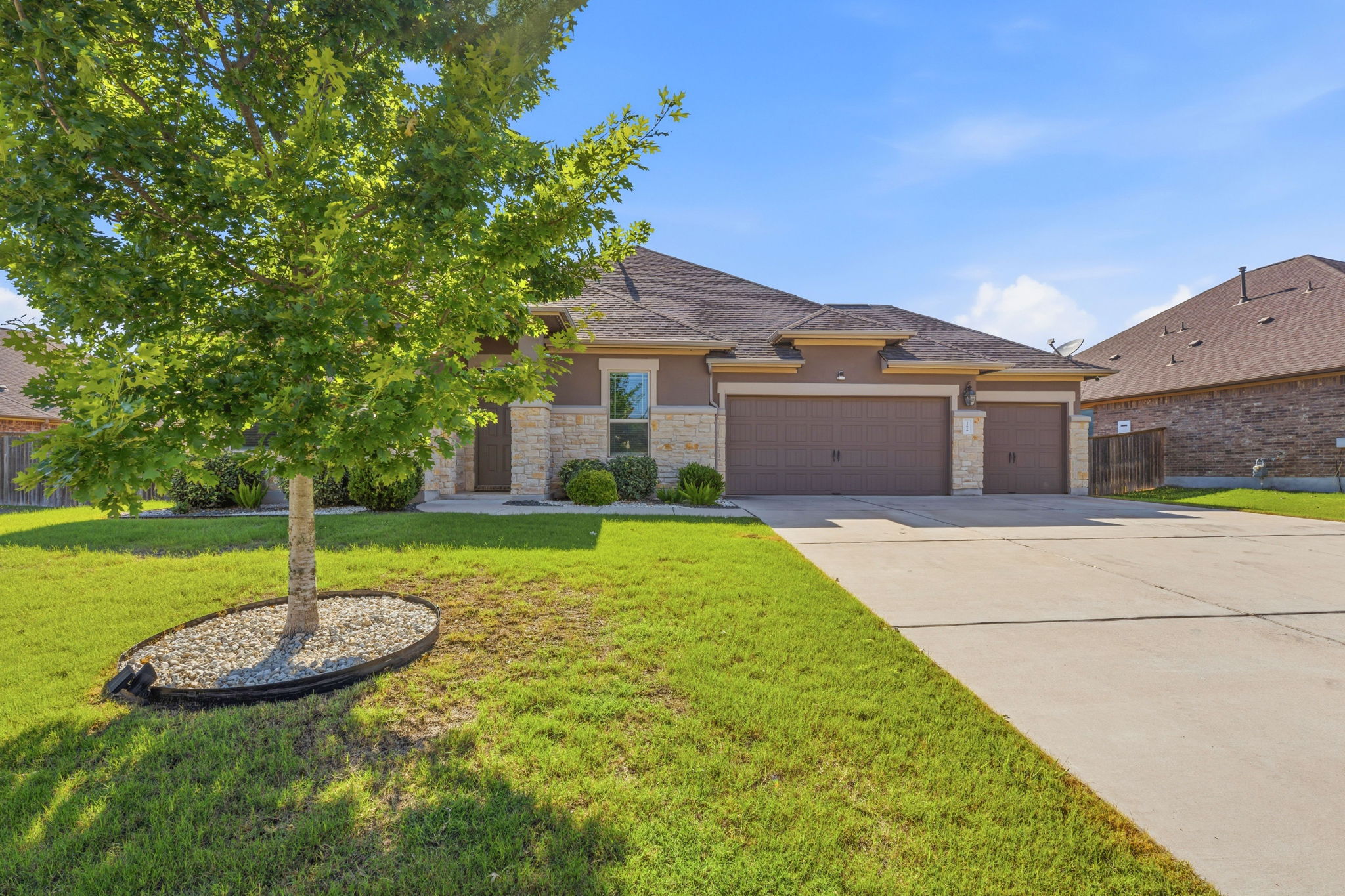 12616 Twisted Root Drive Manchaca, TX 78652 - Photo 6 of 36 The home backs directly to the HOA park, pool, and playground while still feeling remarkably private.