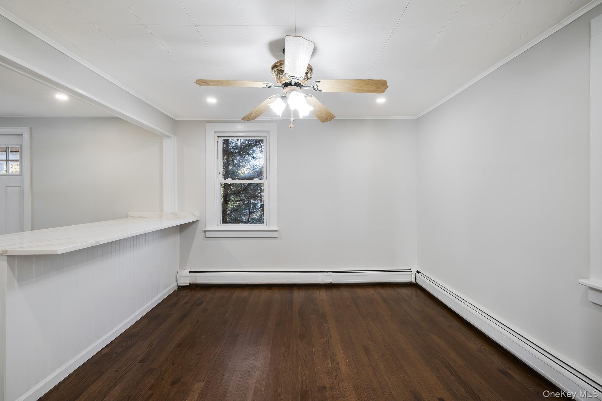 122 Rosman Road Thiells, NY 10984 - Photo 12 of 30 wooden floor in an empty room with a window