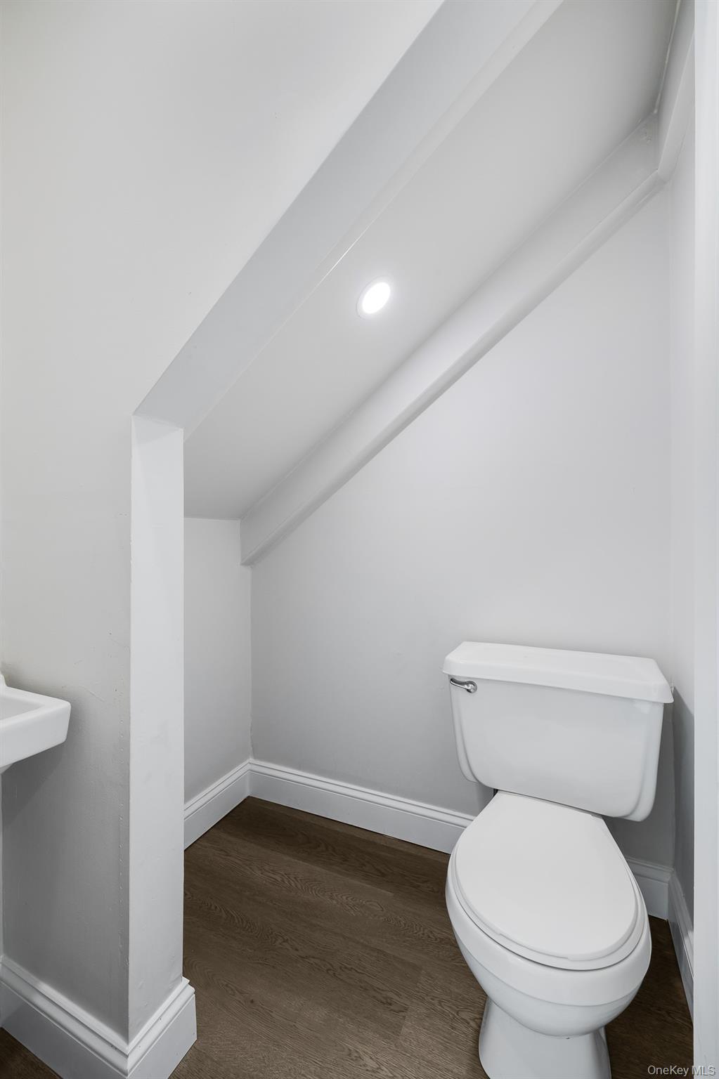122 Rosman Road Thiells, NY 10984 - Photo 18 of 30 a white toilet sitting next to a shower