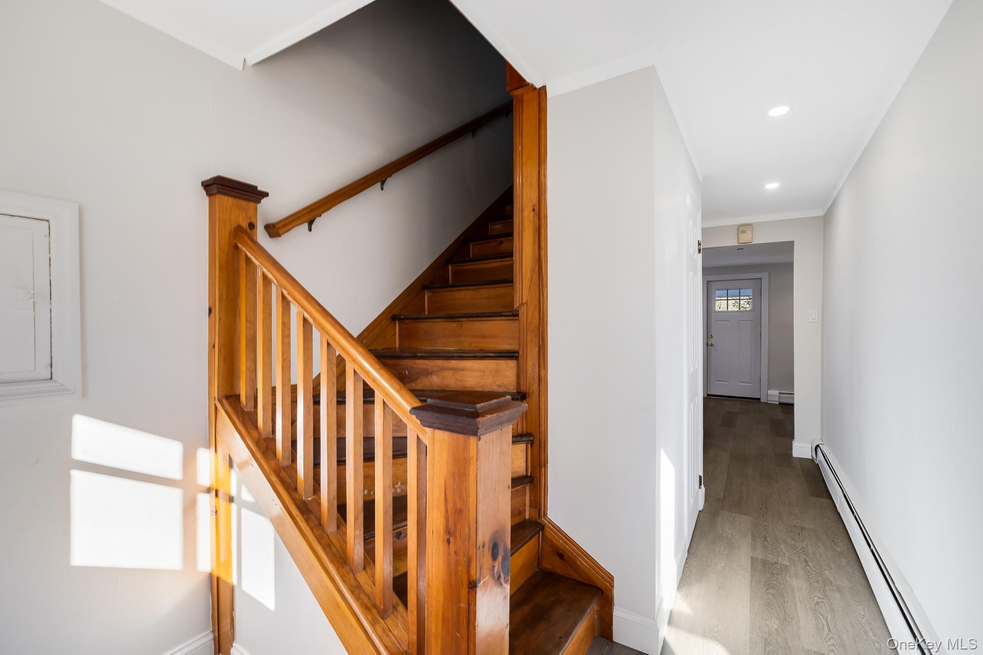 122 Rosman Road Thiells, NY 10984 - Photo 3 of 30 a view of staircase with wooden floor and white walls