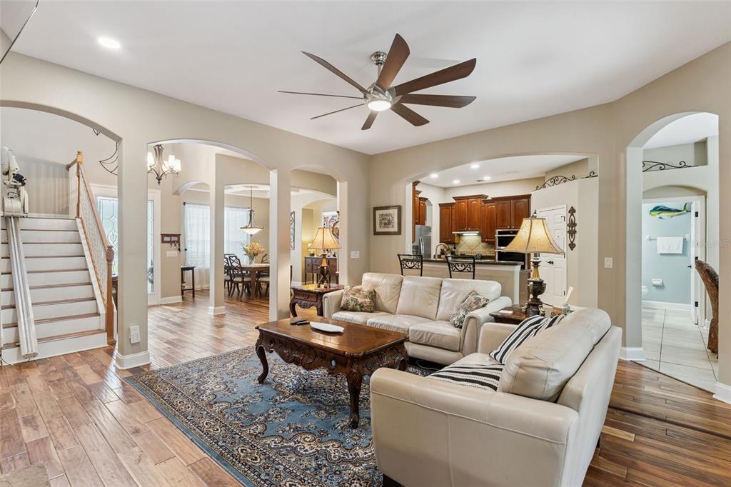 216 Juniper Ridge Court Sanford, FL 32771 - Photo 11 of 61 a living room with furniture and wooden floor