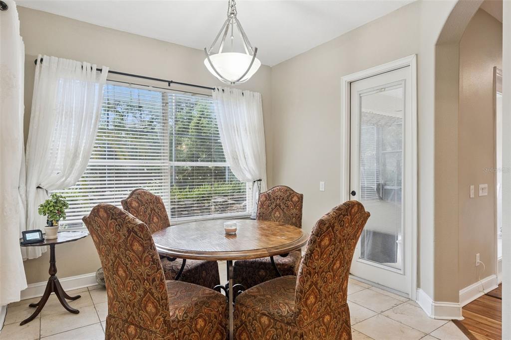 216 Juniper Ridge Court Sanford, FL 32771 - Photo 17 of 61 a view of a dining room with furniture window and outside view