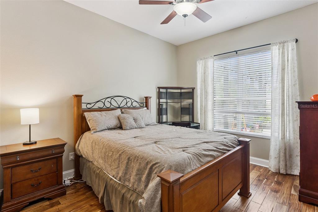 216 Juniper Ridge Court Sanford, FL 32771 - Photo 25 of 61 a bedroom with a bed and a window