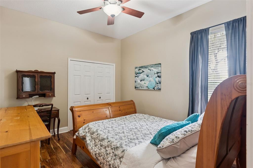 216 Juniper Ridge Court Sanford, FL 32771 - Photo 27 of 61 a bedroom with a bed and furniture