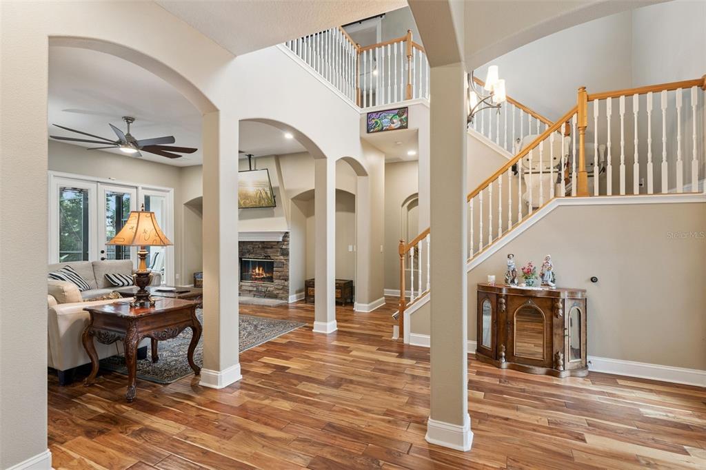 216 Juniper Ridge Court Sanford, FL 32771 - Photo 29 of 61 a view of a livingroom with wooden floor and furniture