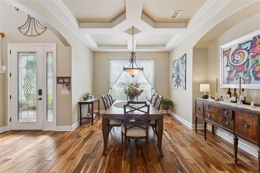 216 Juniper Ridge Court Sanford, FL 32771 - Photo 30 of 61 a view of a dining room with furniture window and wooden floor