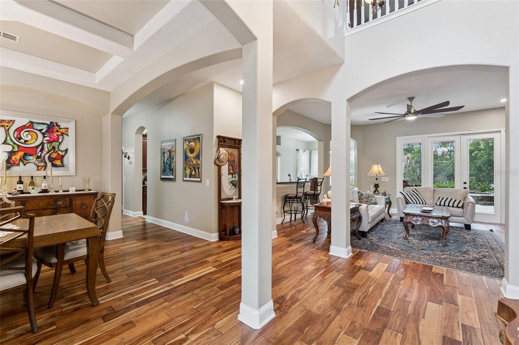 216 Juniper Ridge Court Sanford, FL 32771 - Photo 3 of 61 a living room with furniture and wooden floor