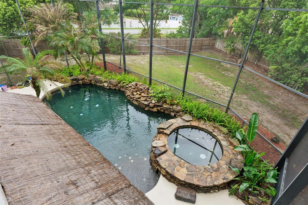 216 Juniper Ridge Court Sanford, FL 32771 - Photo 34 of 61 a backyard of a house with lots of green space