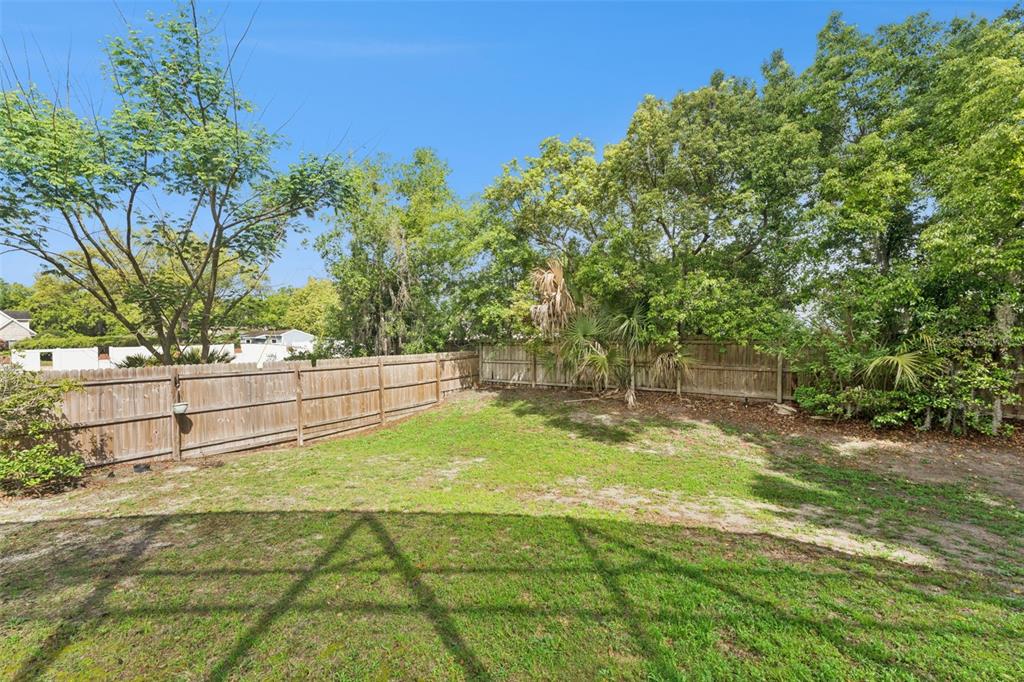 216 Juniper Ridge Court Sanford, FL 32771 - Photo 51 of 61 a view of yard with swimming pool