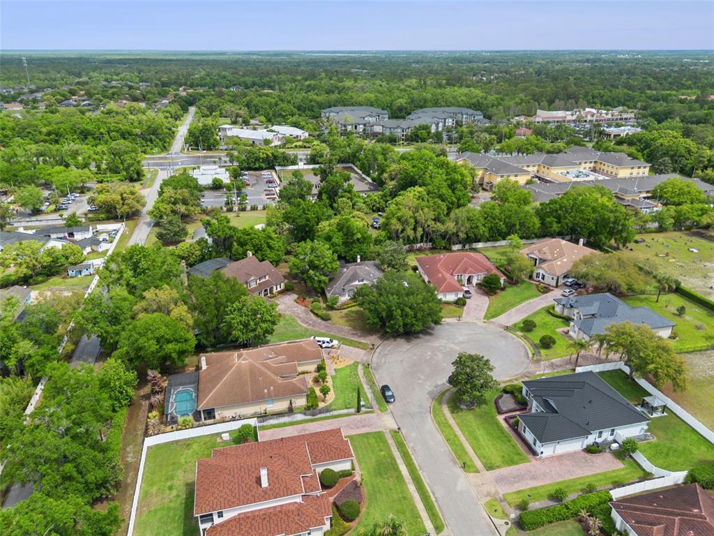 216 Juniper Ridge Court Sanford, FL 32771 - Photo 60 of 61 an aerial view of residential houses with outdoor space and street view