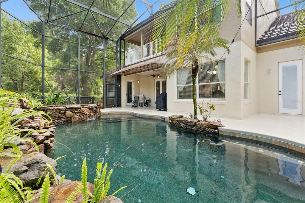 216 Juniper Ridge Court Sanford, FL 32771 - Photo 8 of 61 a view of a house with swimming pool