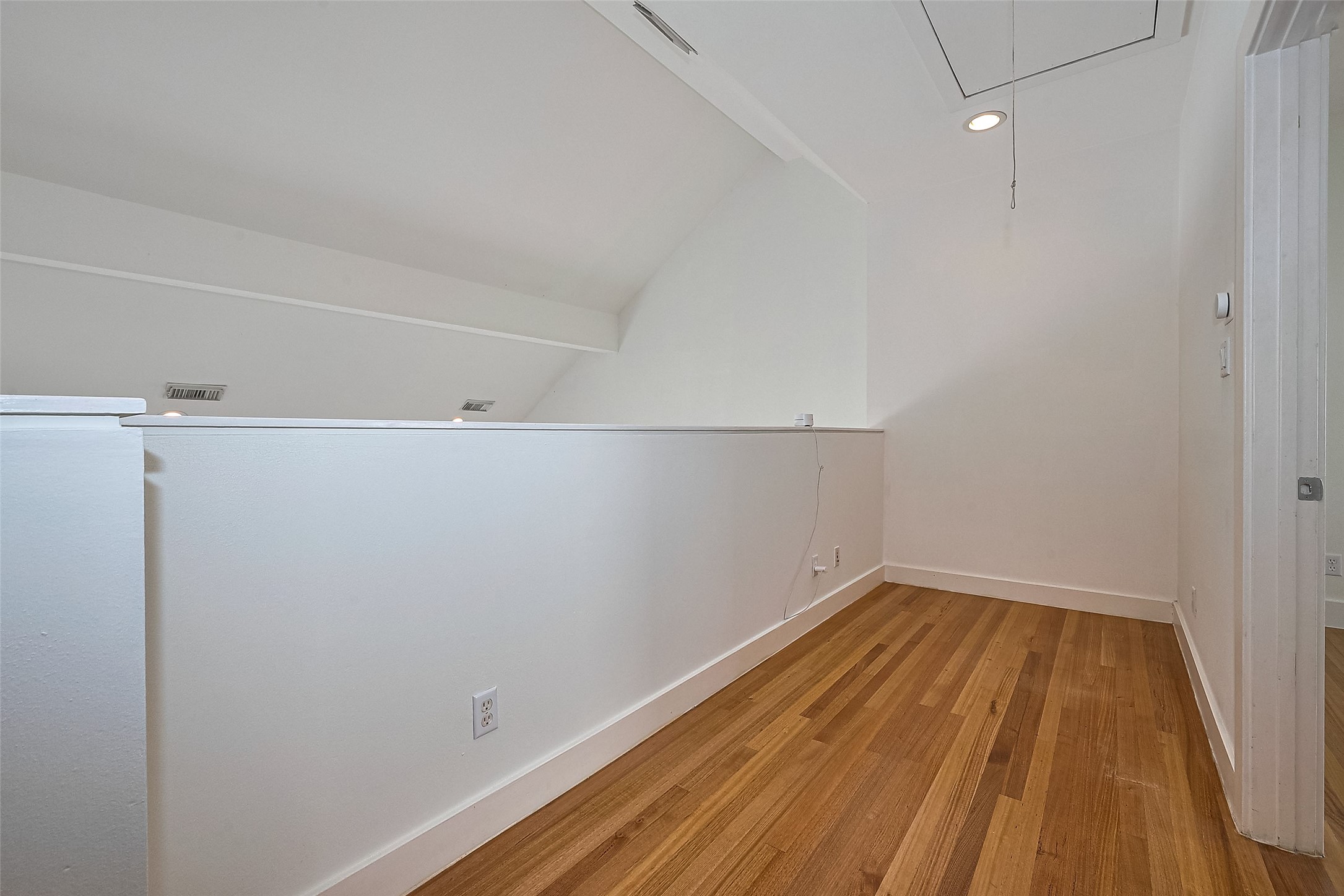 4331 Eigel Street Houston, TX 77007 - Photo 23 of 38 a view of a room with wooden floor