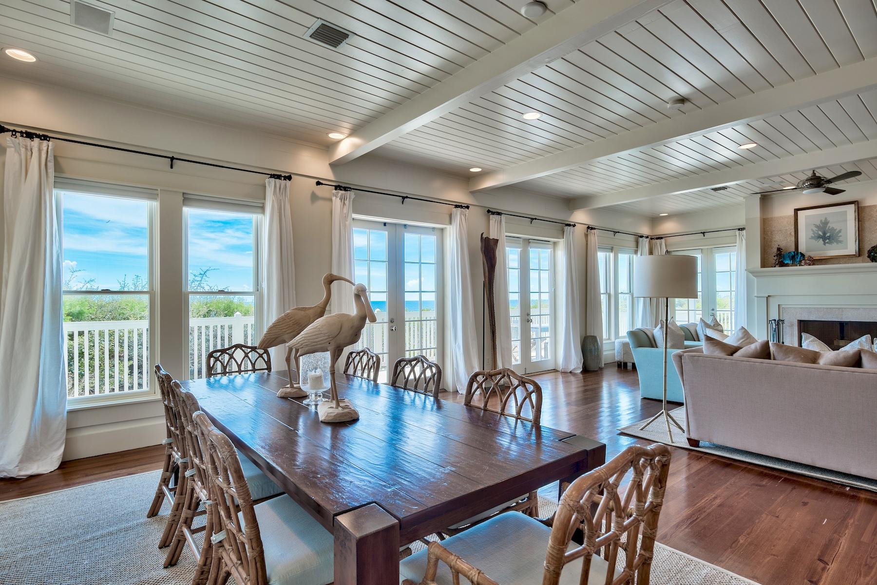 369 Old Beach Road Santa Rosa Beach, FL 32459 - Photo 19 of 50 a view of a dining room with furniture window and wooden floor