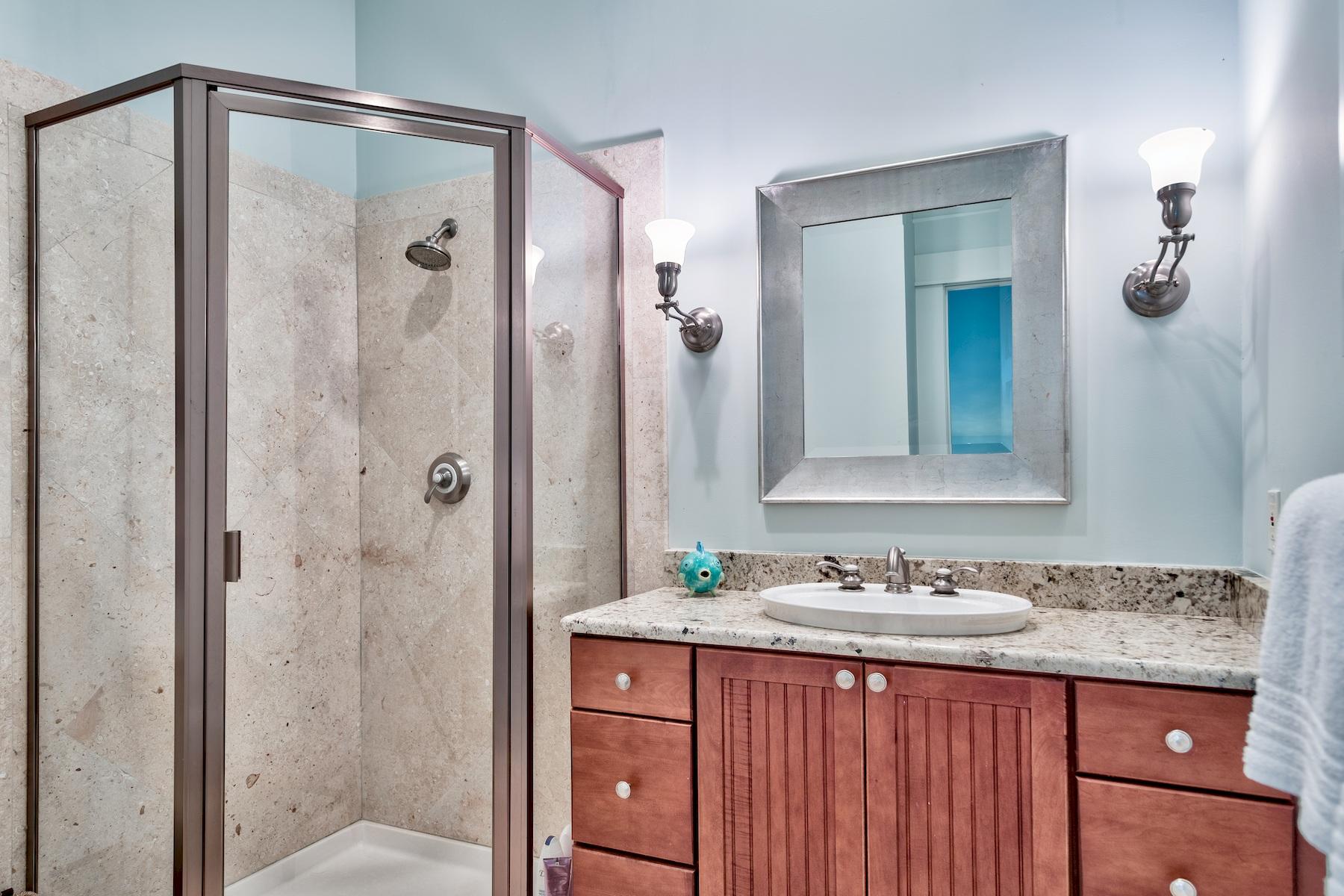369 Old Beach Road Santa Rosa Beach, FL 32459 - Photo 31 of 50 a bathroom with a granite countertop sink shower and a mirror