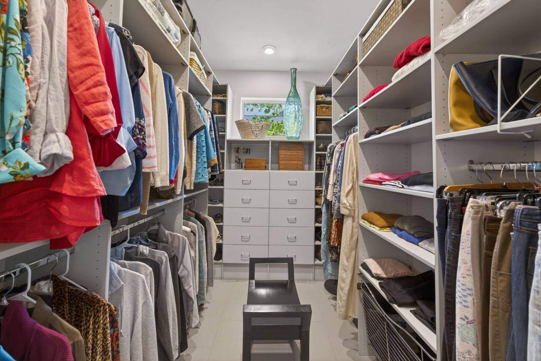 61487 Hackleman Court Bend, OR 97702 - Photo 20 of 35 a view of walk in closet with clothes and shoes