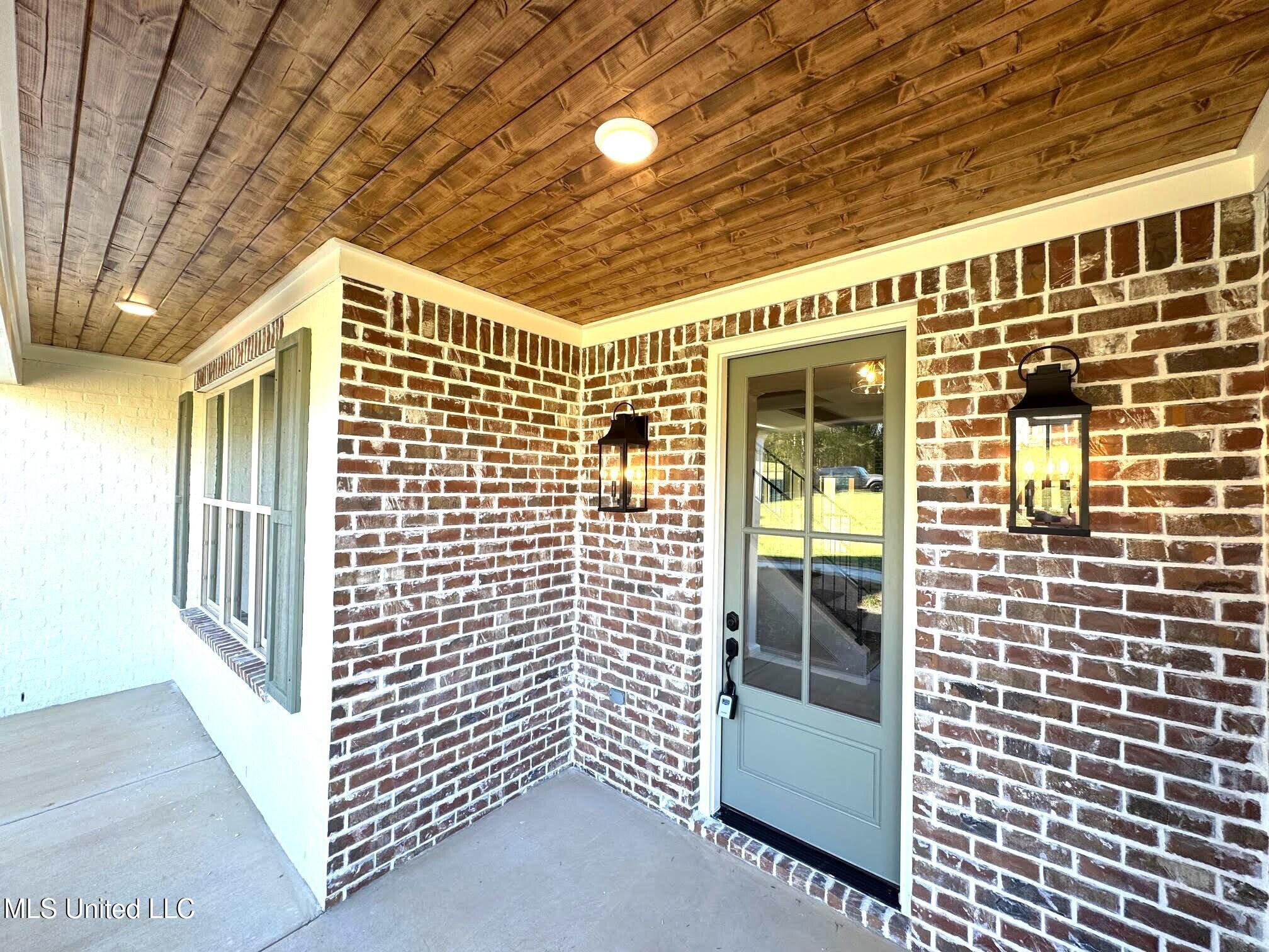 14691 Hidden Loop Byhalia, MS 38611 - Photo 4 of 66 Covered Front Porch