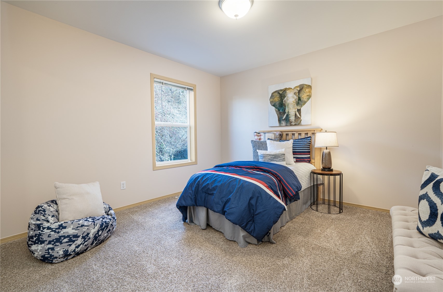 2630 Northeast 2nd Street Renton, WA 98056 - Photo 13 of 19 a bedroom with a bed and a window