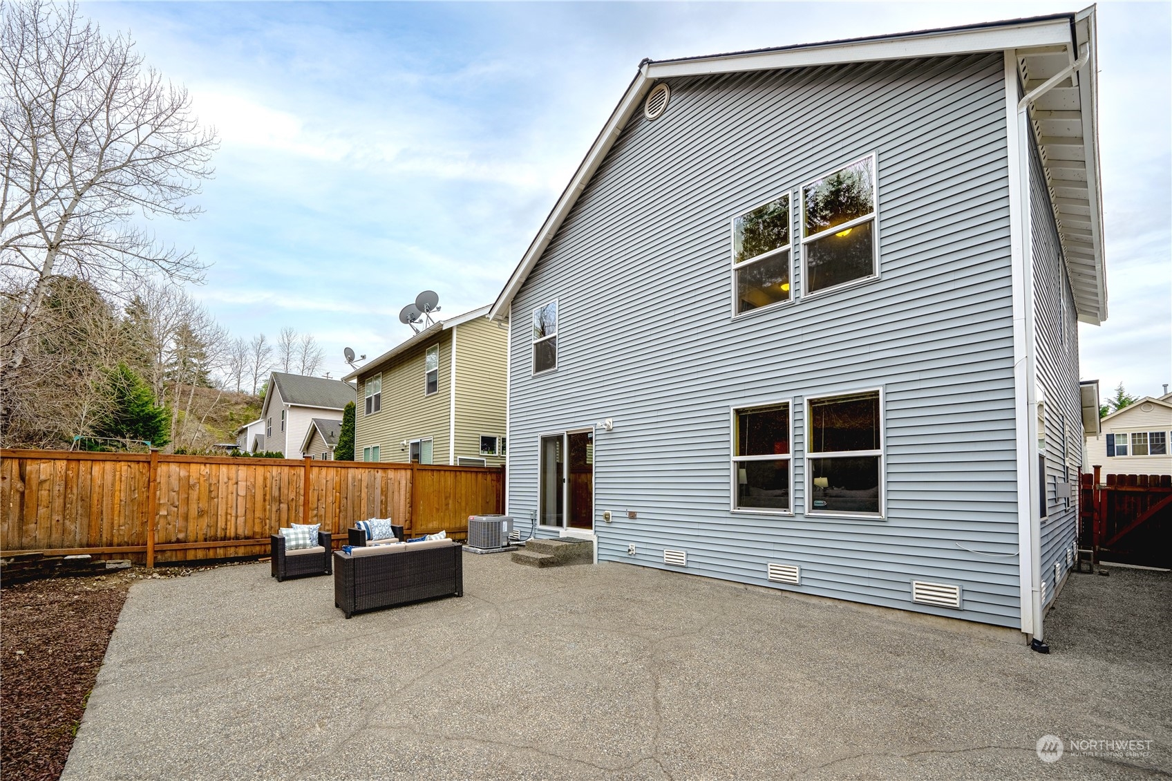 2630 Northeast 2nd Street Renton, WA 98056 - Photo 17 of 19 a view of a house with a yard and parking