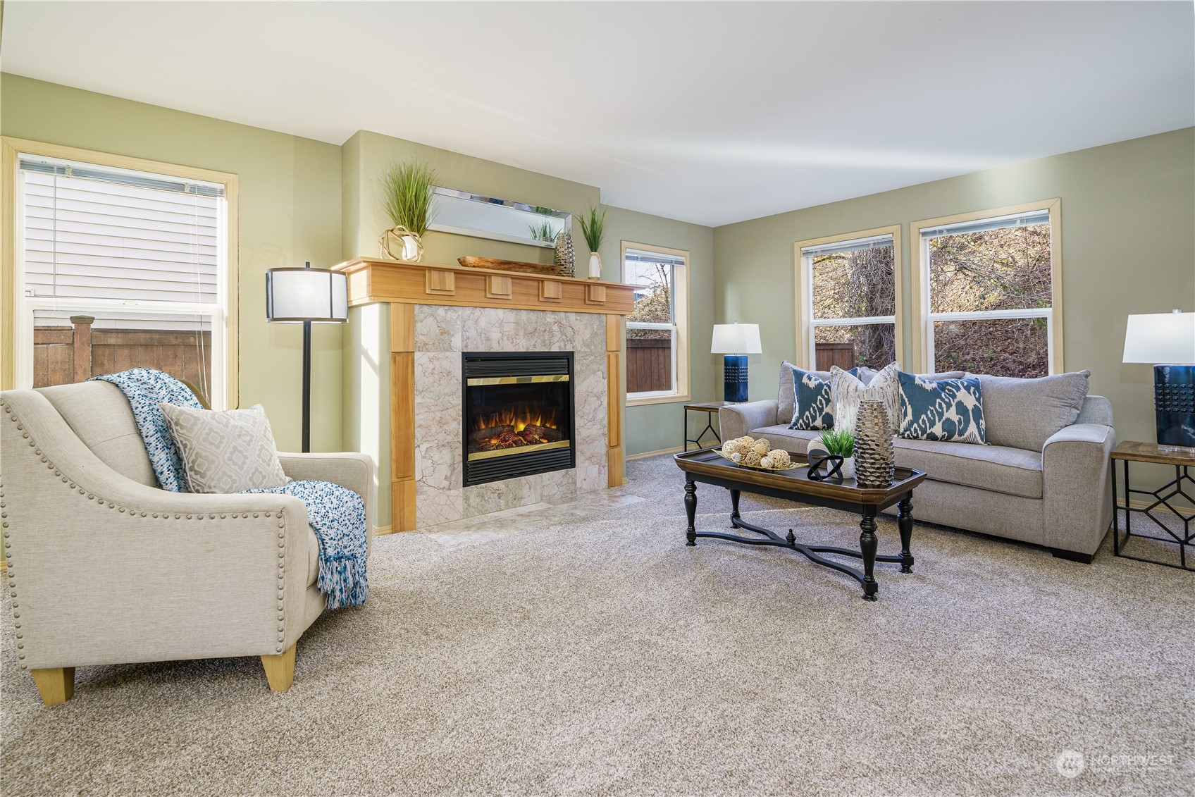 2630 Northeast 2nd Street Renton, WA 98056 - Photo 2 of 19 a living room with furniture and a fireplace