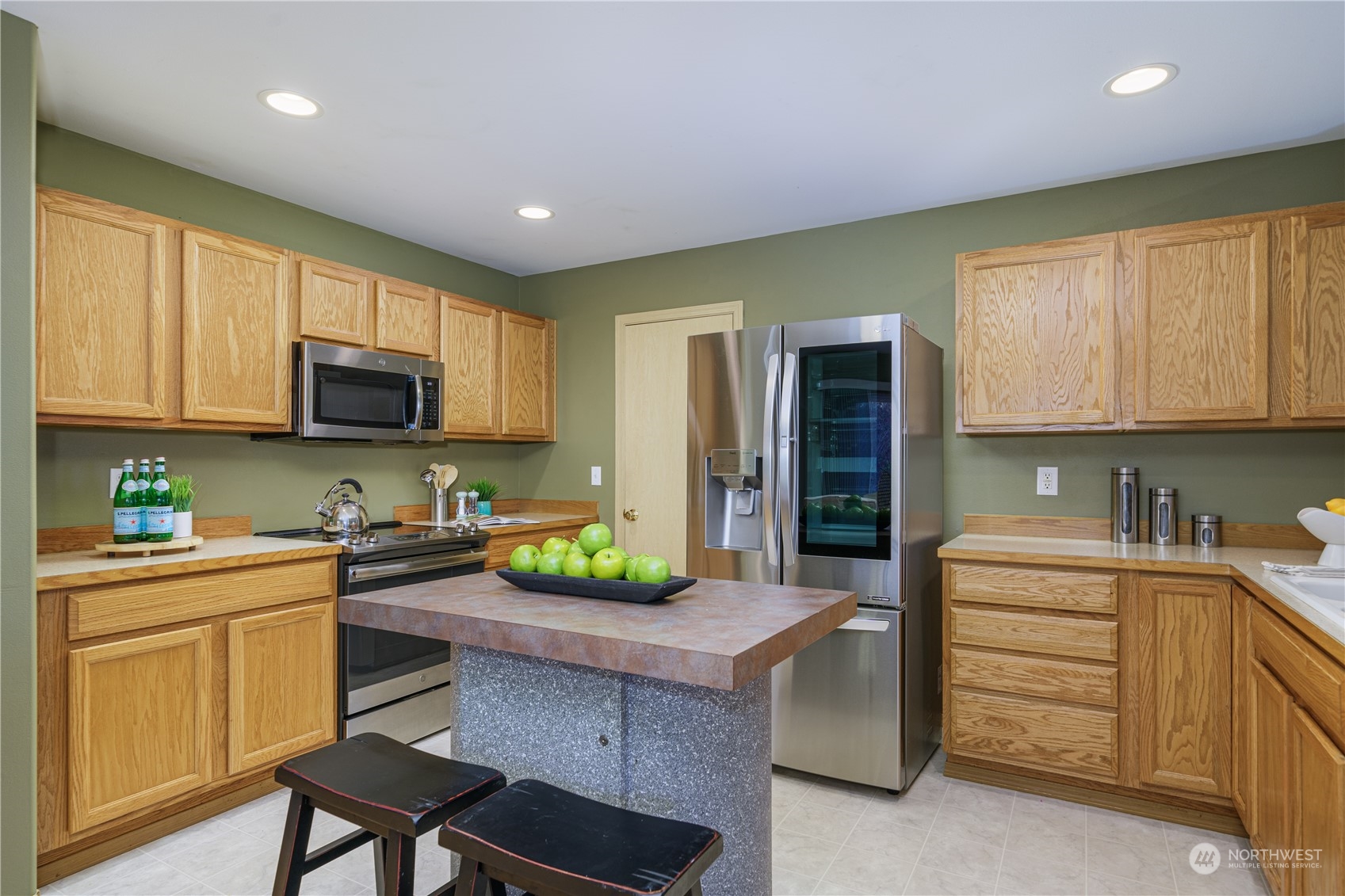 2630 Northeast 2nd Street Renton, WA 98056 - Photo 5 of 19 a kitchen with a sink cabinets and window