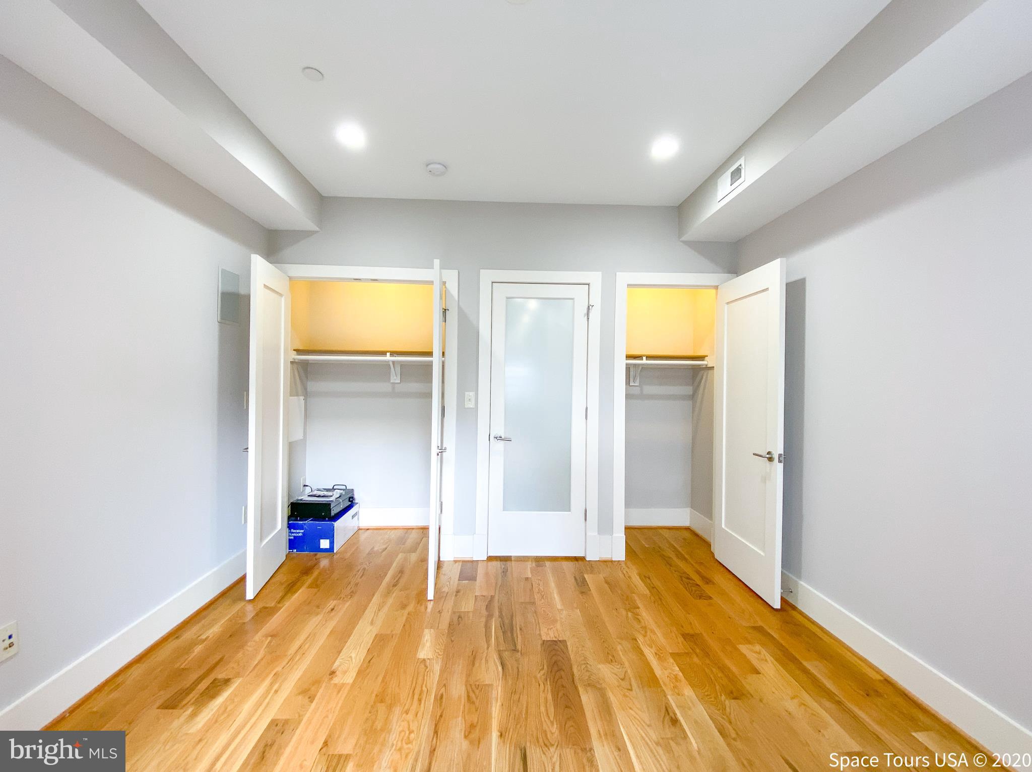 1505 9th Street Northwest, Unit A Washington, DC 20001 - Photo 3 of 10 a view of a room with wooden floor and bathroom