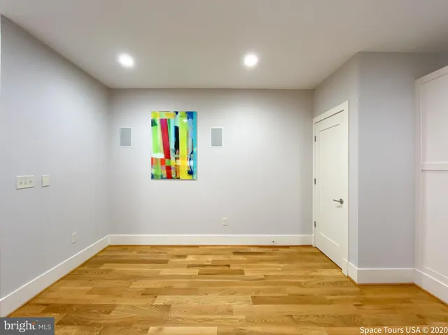 a kitchen with stainless steel appliances granite countertop a refrigerator stove and microwave