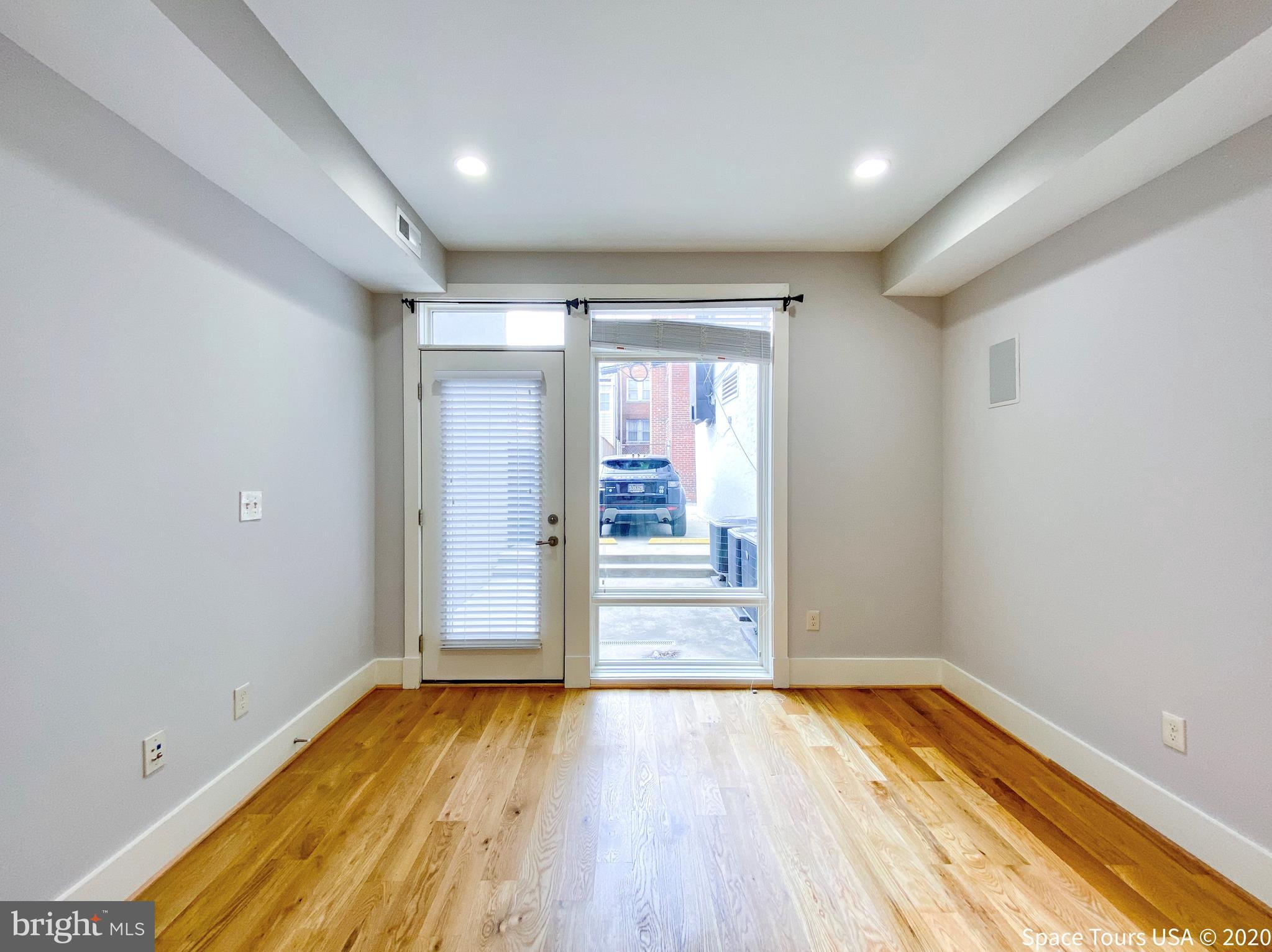 1505 9th Street Northwest, Unit A Washington, DC 20001 - Photo 10 of 10 wooden floor in an empty room