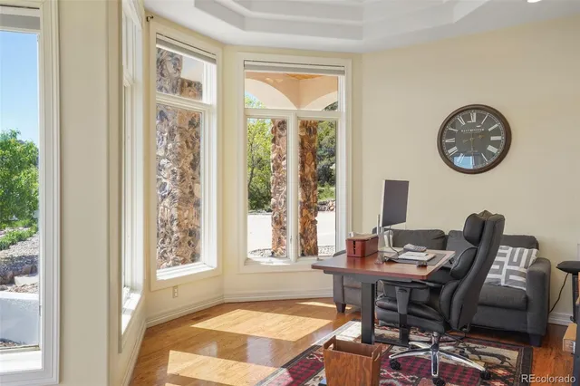 a workspace with furniture and a window