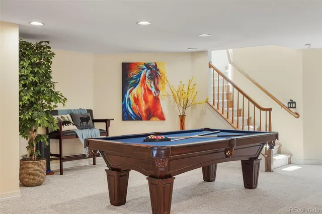 a room with furniture and musical instruments