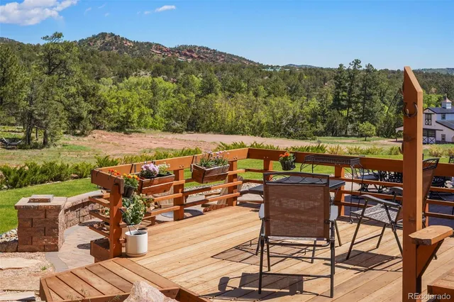a view of a chairs and table on the terrace