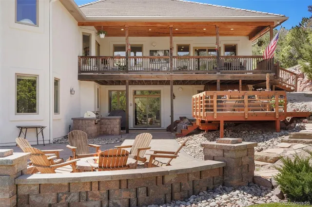 a view of a building with outdoor seating