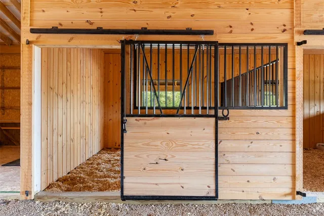 a view of a back yard from a room