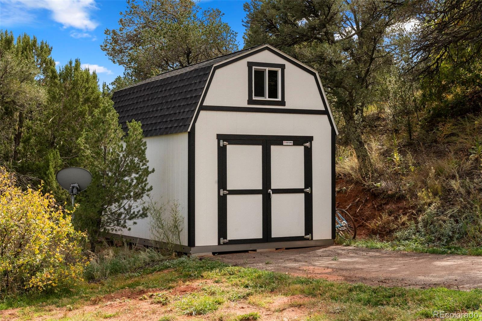 15010 Henry Ride Heights Colorado Springs, CO 80926 - Photo 46 of 50 a front view of a house with a yard